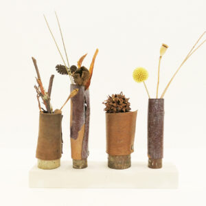 Four Wooden Vessel's On Stand